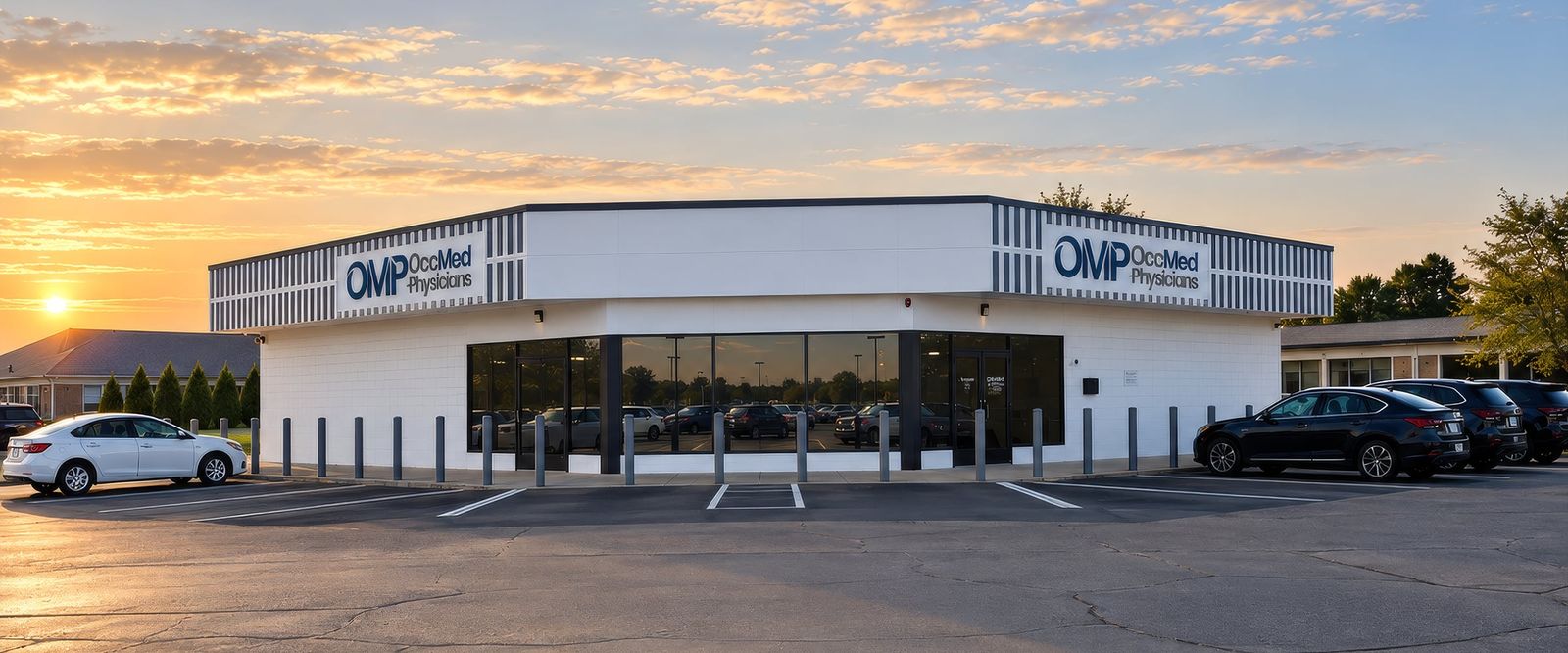 The OMP clinic building and parking lot at sunset